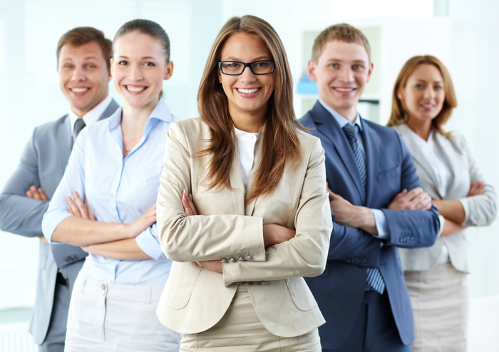 woman-standing-at-the-front-and-others-standing-behind