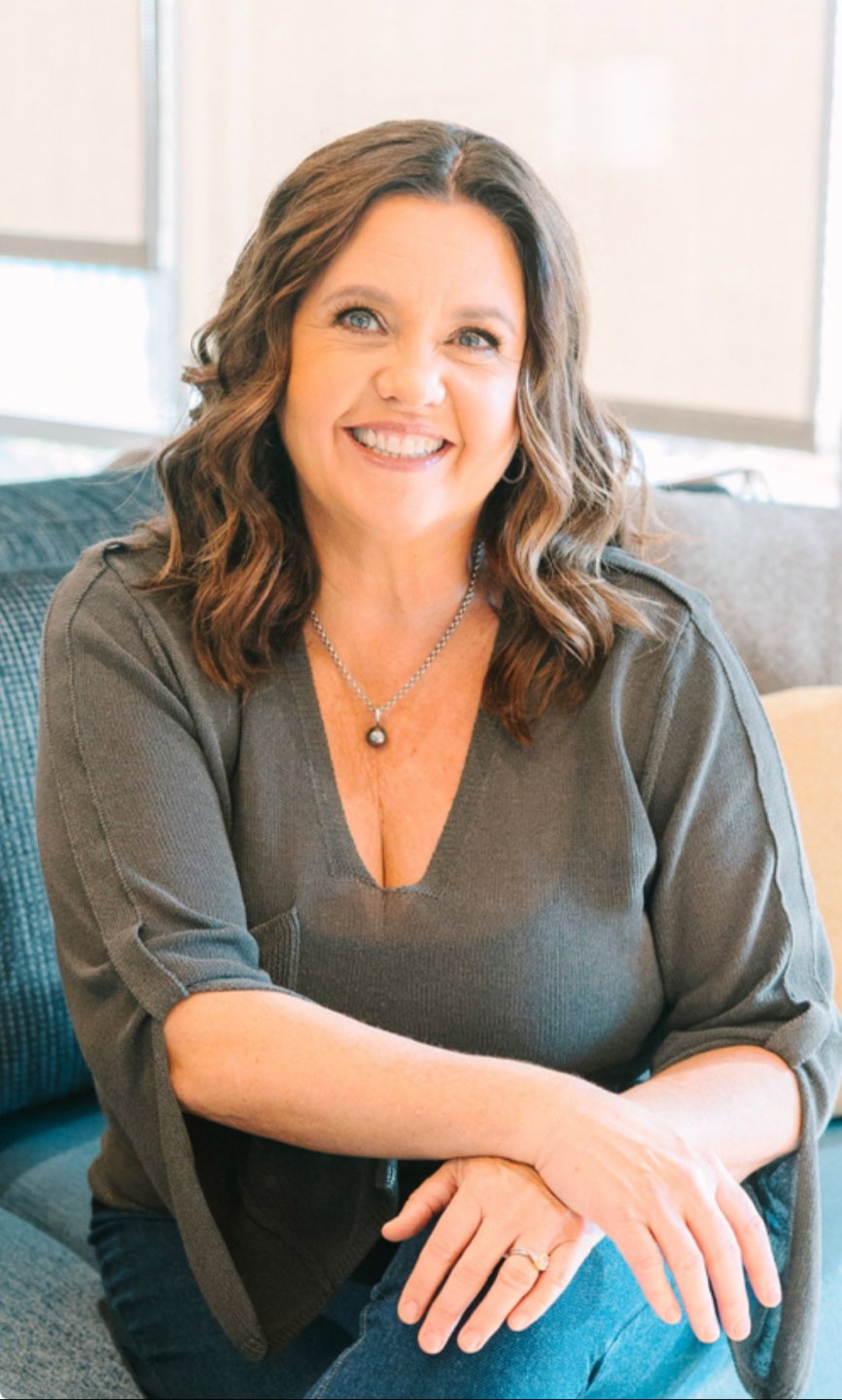 Stephanie Hunter, massage therapist and pain relief expert, with a warm approachable smile